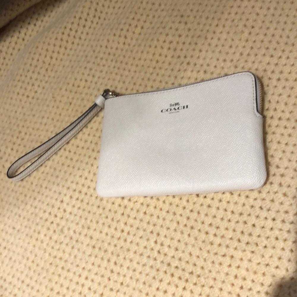 NWT Coach wristlet zipper handheld bag cream in color